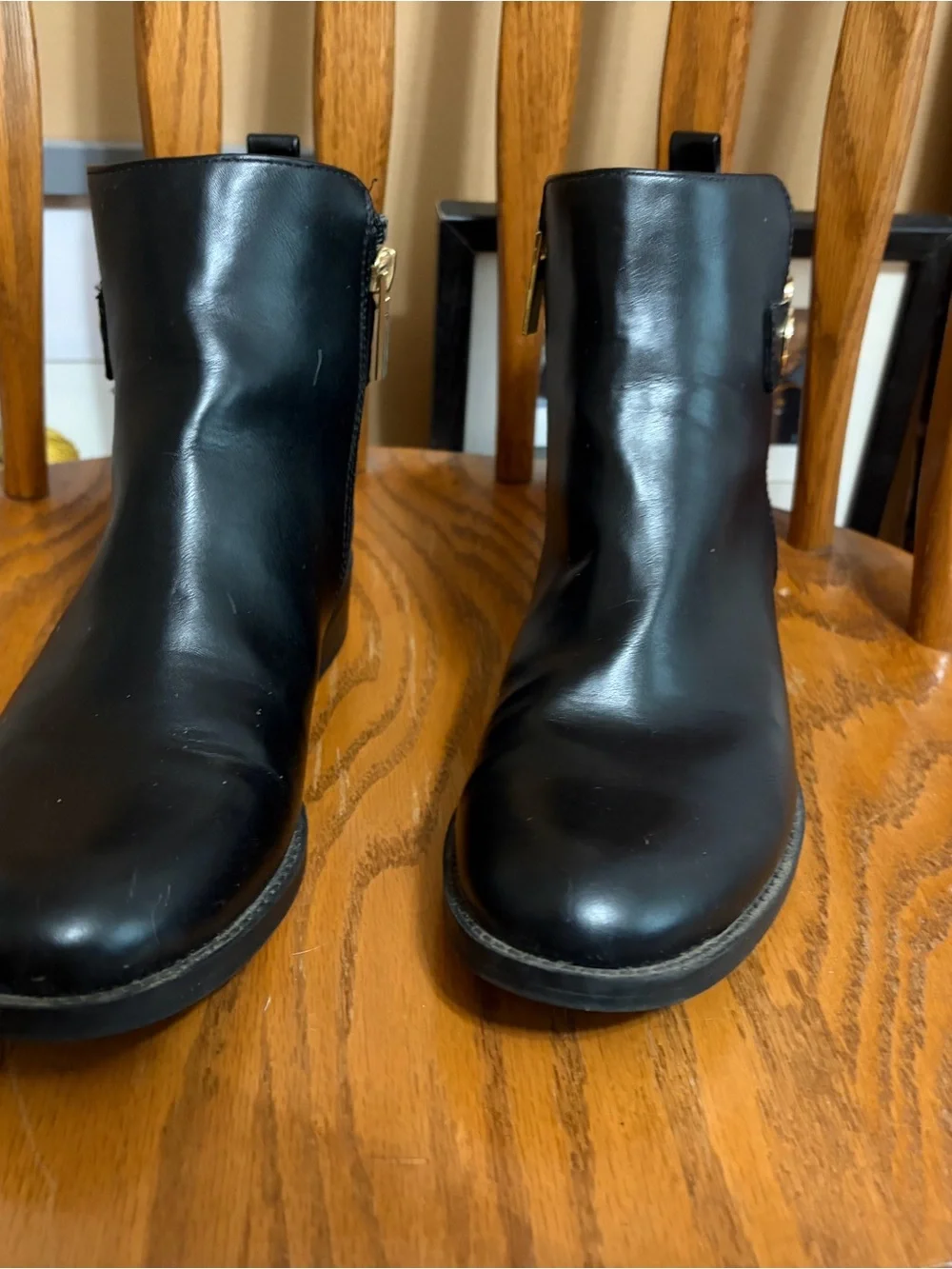 Tommy Hilfiger Black Leather Ankle Booties with Gold Accent